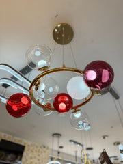 Lámpara Colgante Orbital Moderna Dorada con Esferas de Cristal Ámbar, Rojo y Transparente LED Decorativa